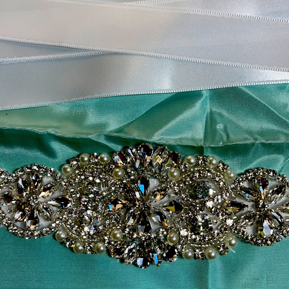 White sparkly wedding belt.
